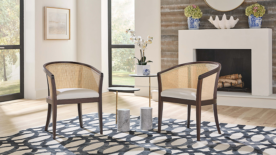 two abbey arm chairs by a fireplace